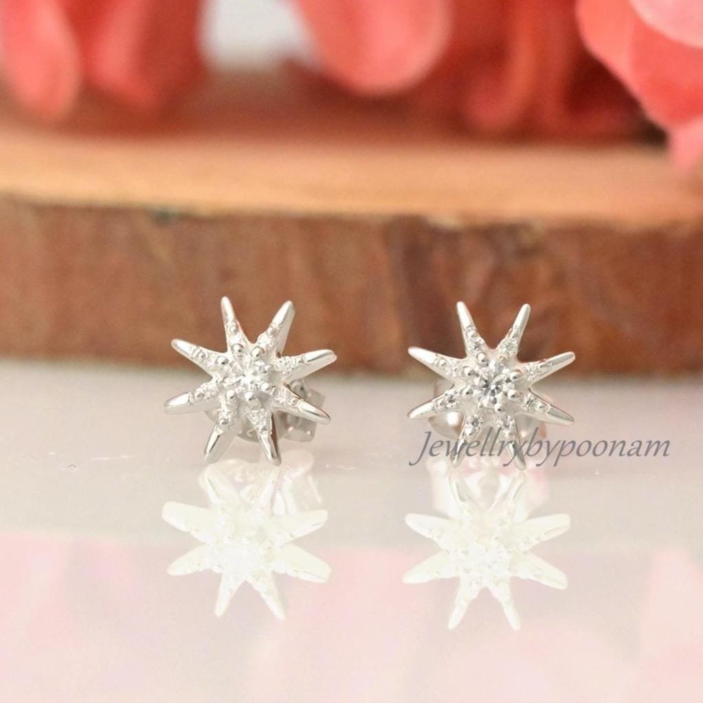 925 Sterling Silver Moissanite Star Stud Earrings: Dainty Silver Starburst - View 3 - Jewelry By Poonam | SKU: PJE2024-SLYGCZ 925 Sterling Silver Moissanite Star Stud Earrings: Dainty Silver Starburst - View 3 - Jewelry By Poonam | SKU: PJE2024-SLYGCZ