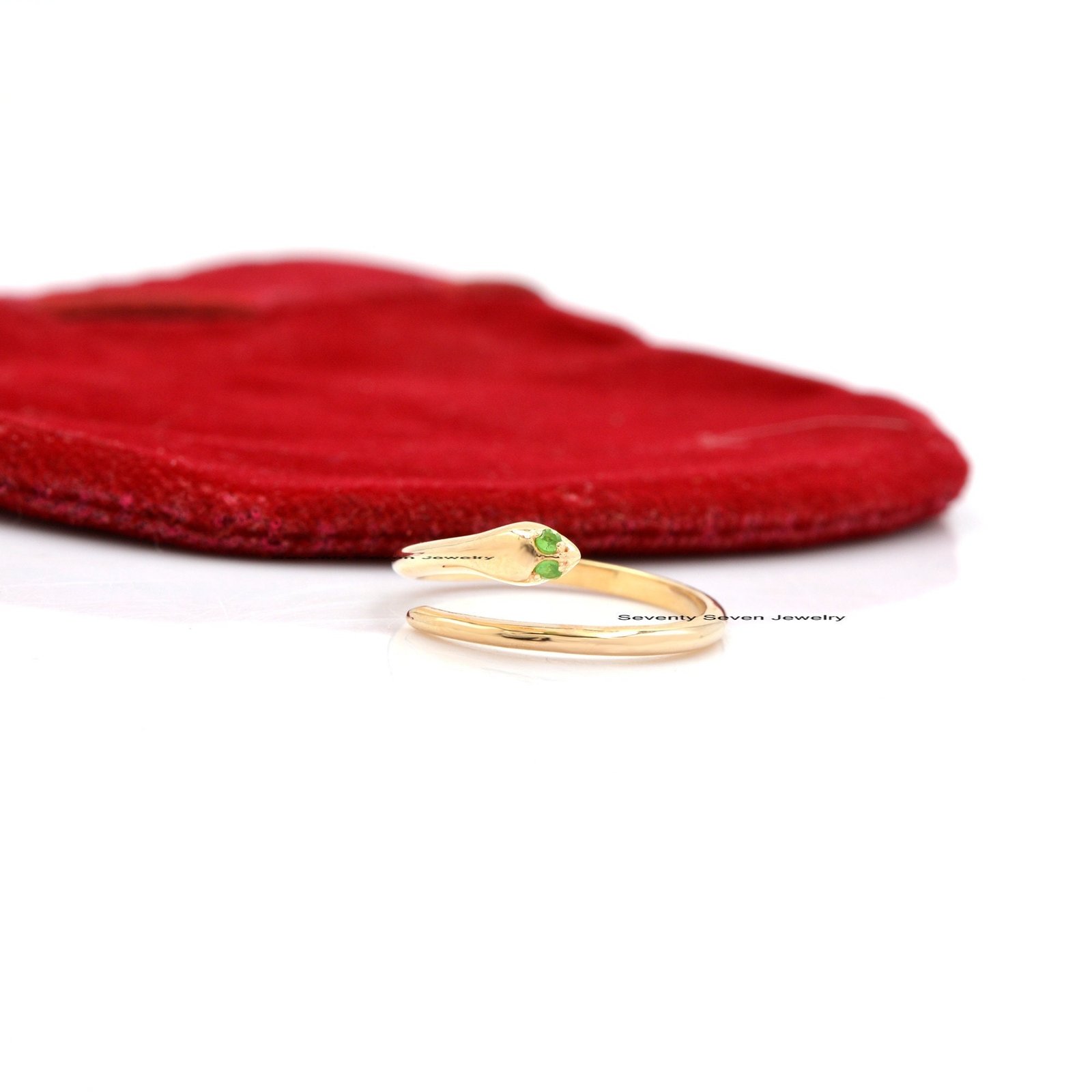 9k Gold Emerald Snake Ring: Dainty Serpent Stacking Band - Seventy Seven Jewelry | SKU: SSMJR03-9KYGDI-2026 9k Gold Emerald Snake Ring: Dainty Serpent Stacking Band - Seventy Seven Jewelry | SKU: SSMJR03-9KYGDI-2026