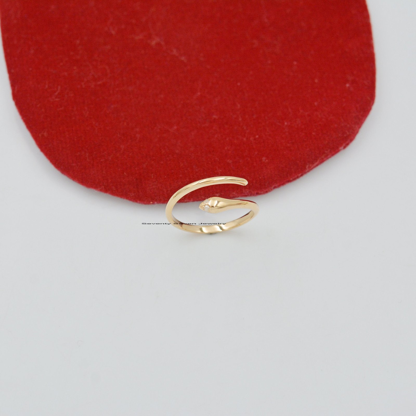 9k Gold Emerald Snake Ring: Dainty Serpent Stacking Band - View 3 - Seventy Seven Jewelry | SKU: SSMJR03-9KYGDI-2026 9k Gold Emerald Snake Ring: Dainty Serpent Stacking Band - View 3 - Seventy Seven Jewelry | SKU: SSMJR03-9KYGDI-2026