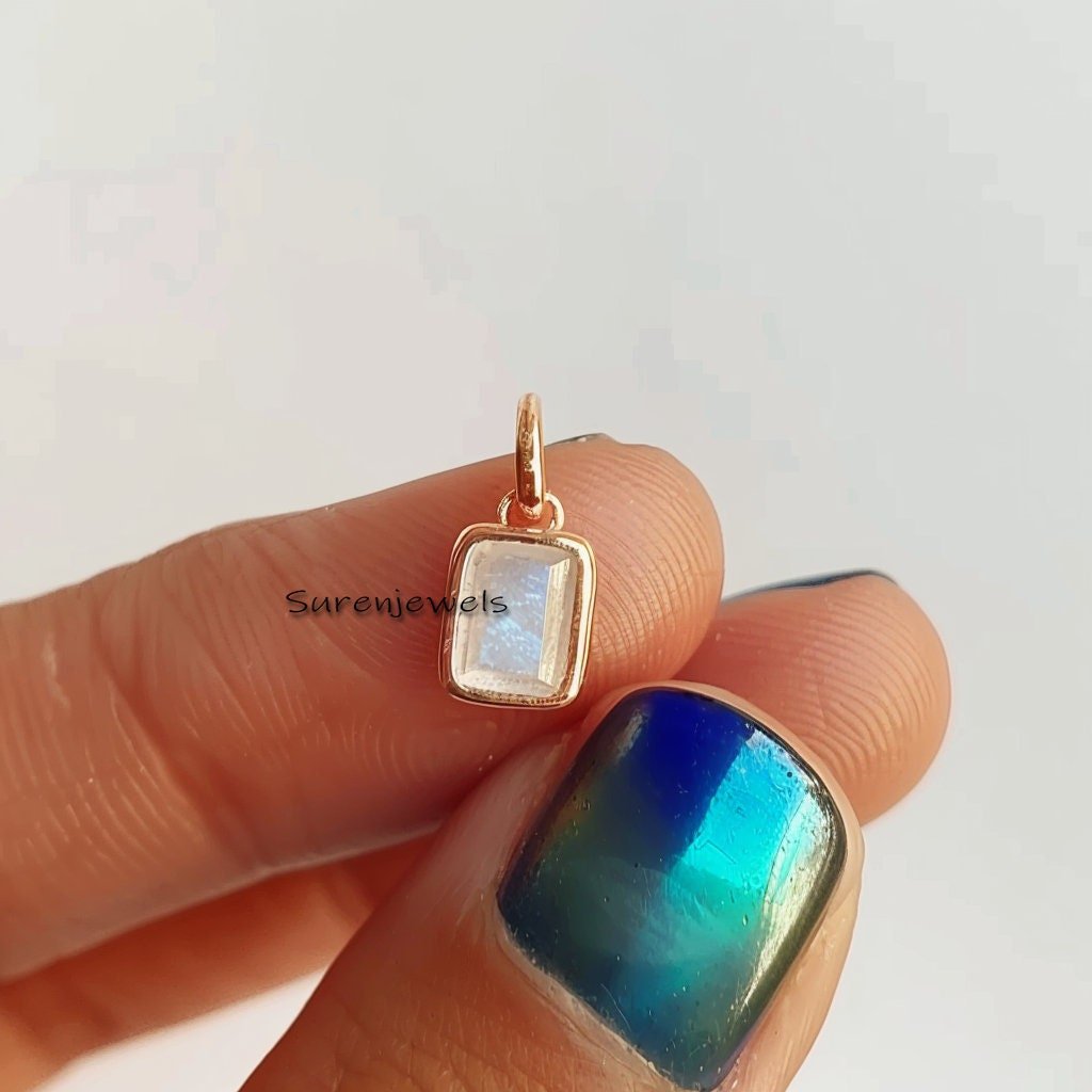 14K Gold Bezel Moonstone Pendant: Emerald Cut Charm - Suren Jewels | SKU: SJP3480-SLYGMK-12M 14K Gold Bezel Moonstone Pendant: Emerald Cut Charm - Suren Jewels | SKU: SJP3480-SLYGMK-12M