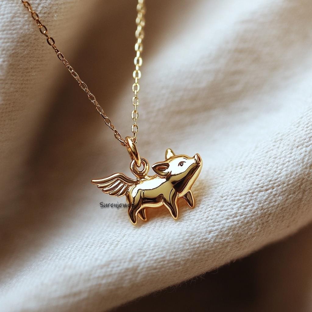 14k Gold Flying Pig Pendant: Solid Gold Animal Jewelry - Suren Jewels | SKU: SJP4613-SLWG-20M 14k Gold Flying Pig Pendant: Solid Gold Animal Jewelry - Suren Jewels | SKU: SJP4613-SLWG-20M