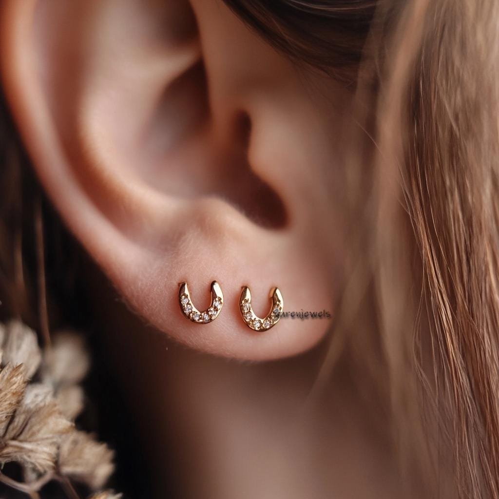 14k Gold Horseshoe Stud Earrings: Lucky Mini Studs - Suren Jewels | SKU: SJE2519-SLYGRU-10M 14k Gold Horseshoe Stud Earrings: Lucky Mini Studs - Suren Jewels | SKU: SJE2519-SLYGRU-10M