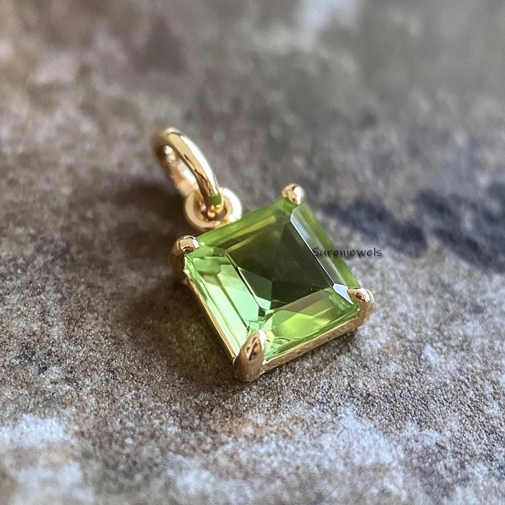 14K Gold Peridot Emerald Cut Solitaire Pendant: Bezel Setting - Suren Jewels | SKU: SJP4361-SLNSBCH-15M 14K Gold Peridot Emerald Cut Solitaire Pendant: Bezel Setting - Suren Jewels | SKU: SJP4361-SLNSBCH-15M